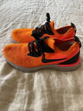 Nike Orange and Black Flyknit Running Sneakers